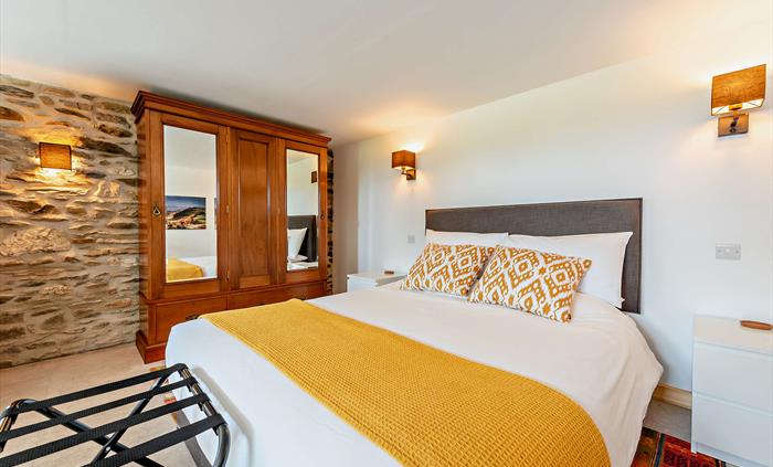 The superking bed has 2000 springs and natural fillings for a comfortable stay in your sustainable accommodation.
